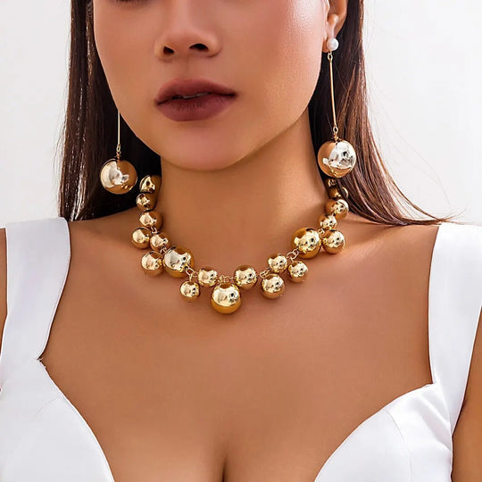 BettyRae – Sculpted Golden Sphere Necklace